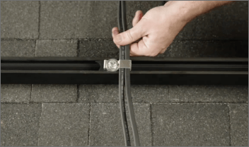 Snap-in wire-management clip on the rail